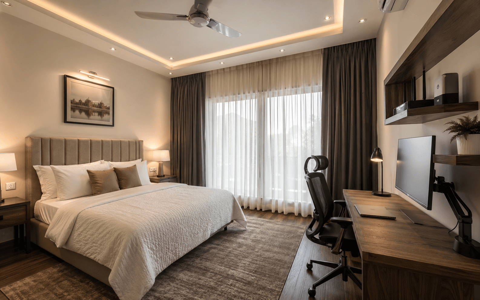 Executive bedroom workspace with monitor and blackout curtains